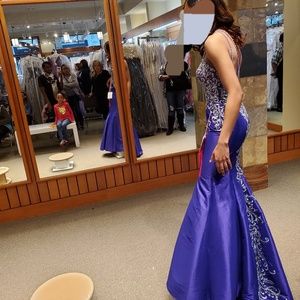 Newly purchased, never worn prom gown with tags